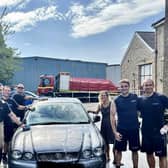 MP for Batley and Spen Kim Leadbeater with members of Cleckheaton Fire Service at their charity car was event.
