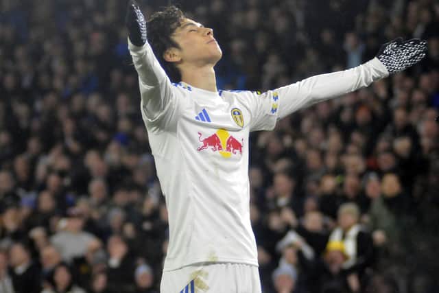 Ao Tanaka celebrates his late equaliser.
