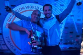 World champion Jermaine Manners celebrates with his son Jordan.