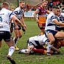 Batley Bulldogs will be hoping for more cup success this Sunday in the Challenge Cup against Workington Town following on from their heroics against Featherstone Rovers last weekend in the 1895 Cup. Luke Cooper, pictured, goes over for Batley's first try in the 15-14 win.