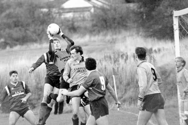 Match action from Dewsbury Moor Athletic's clash against Horbury Town in November 1989. Pictured is Horbury Town goalkeeper Paul Reynolds safely collects the ball from a corner