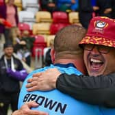 Batley Bulldogs head coach Craig Lingard hugs captain James Brown after the 1895 Cup semi-final victory at York Knights. (Photo credit: Paul Butterfield)