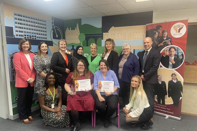 Chloe Llewellyn, second from front left, a TA at Batley Girls' High School, received the HLTA (Higher Level Teaching Assistant) Secondary School trophy from Teaching Personnel at a ceremony held at the school.
