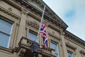 Flag flys half-mast outside Batley Town Hall.