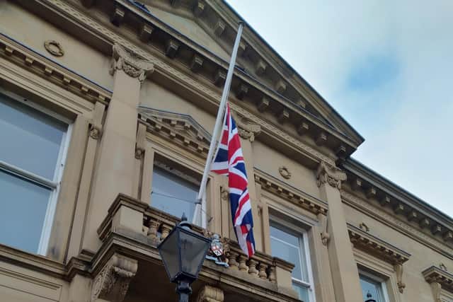 Flag flys half-mast outside Batley Town Hall.