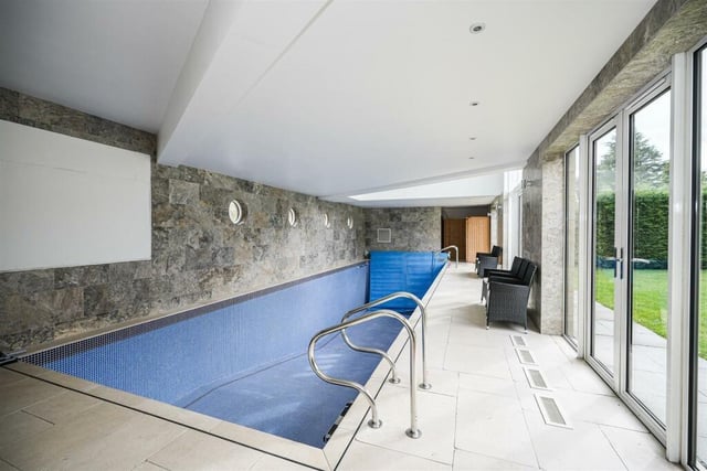 The heated indoor swimming pool has shower rooms, a sauna and a plant room to one end.