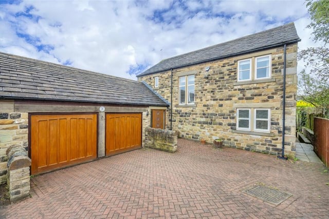 Grove Farm, Kirkgate, Hanging Heaton, is on sale with Manning Stainton priced £550,000