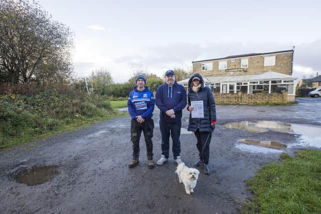 The Kirklees Council-owned land, at Croft Street, which backs on to Birkenshaw Liberal Club,Council selling land next Birkenshaw Libral Club, is up for auction today (Tuesday), raising concerns from community members. Pictured are, from the left, Ian Stuart from Birkenshaw Bluedogs rugby club, steward Ben Goulding, Georgina King, who is concerned about the local wildlife, and Marcey the dog.