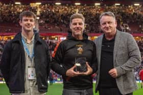 Shaw Cross Sharks chairman Richard Stephenson receives the Community Club of the Year award at Old Trafford.