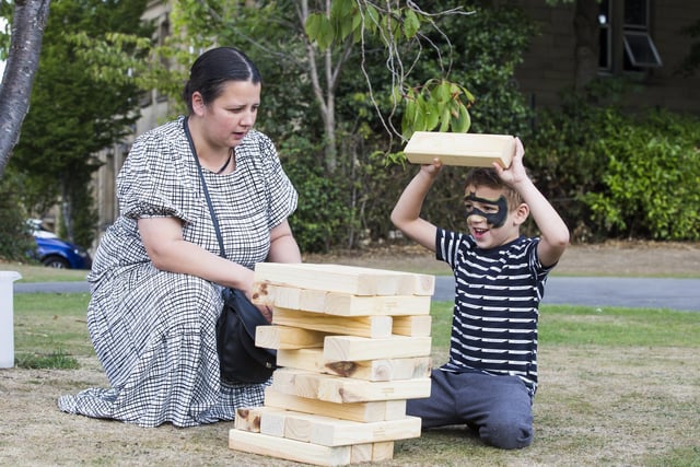 Amaan Matthewman, five, plays giant Jenga with mum Zoe Matthewman