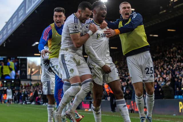Junior Firpo celebrates his winning goal against Southampton with Leeds United teammates.