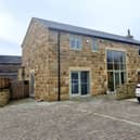 The distinctive stone-built conversion property is for sale at £475,000.