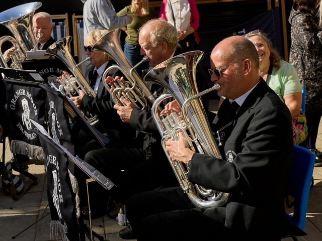 The Grange Moor Brass Band were in attendance.