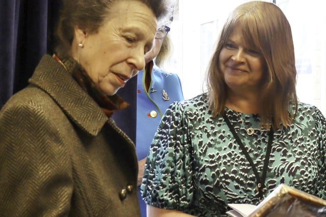 An artwork gift is presented to the Princess Royal.