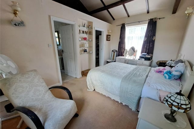 A beamed and spacious double bedroom.