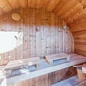 Inside the garden's stylish 'barrel sauna' that also has a shower facility.
