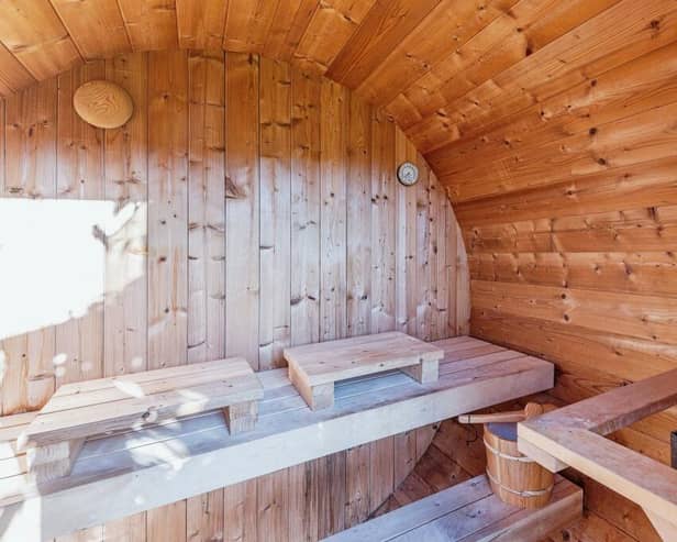 Inside the garden's stylish 'barrel sauna' that also has a shower facility.