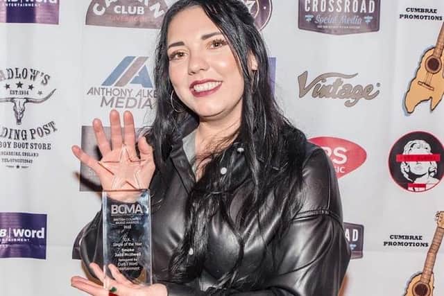 Jade Helliwell with the BCMA Award for Song of The Year.