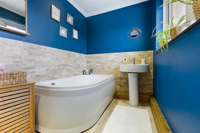 A super size bath is a feature in this house bathroom.