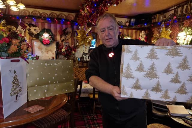 Tim Wood, landlord of the Old Colonial in Mirfield, with his Christmas hampers which were distributed to the elderly around the town.
