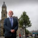Former councillor Eric Firth pictured outside Dewsbury Town Hall.