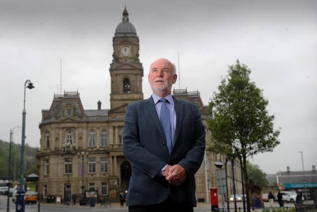 Former councillor Eric Firth pictured outside Dewsbury Town Hall.