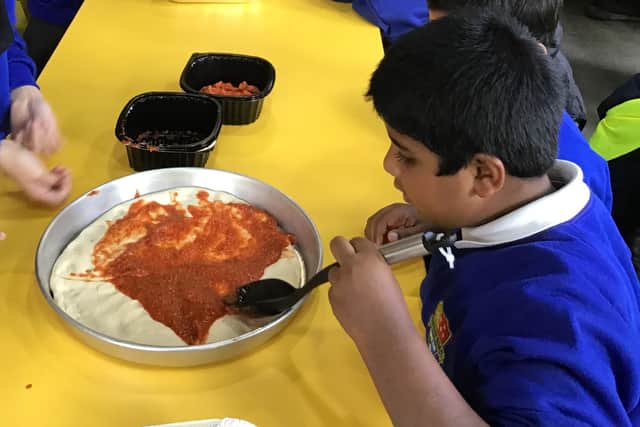The children made pizza during their visit to the Batley restaurant.