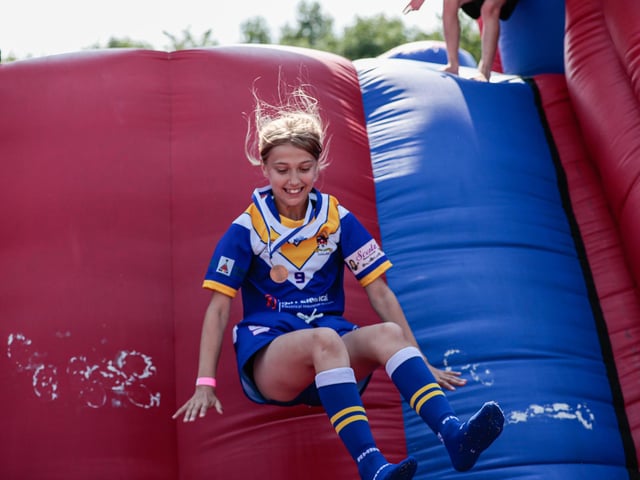 A youngster having fun at Batley Bulldogs' Pink Weekend at the Fox's Biscuits Stadium to raise funds for a breast cancer charity