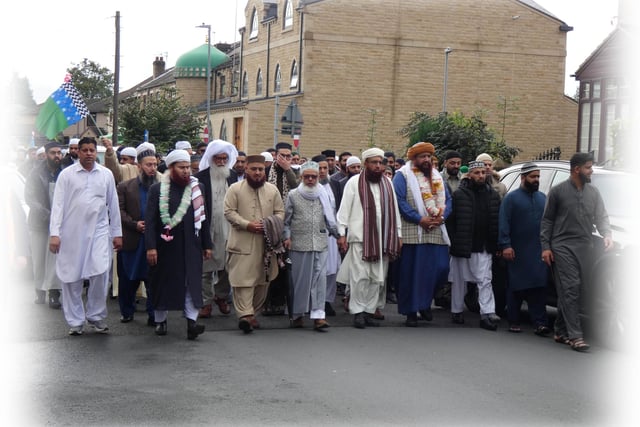 The peace procession leaves Ghausia Jamia Mosque from Warren Street, Savile Town, led by local Mosque Imams