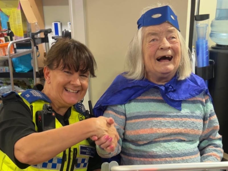 Resident Marjorie with one of the visiting PCSOs.