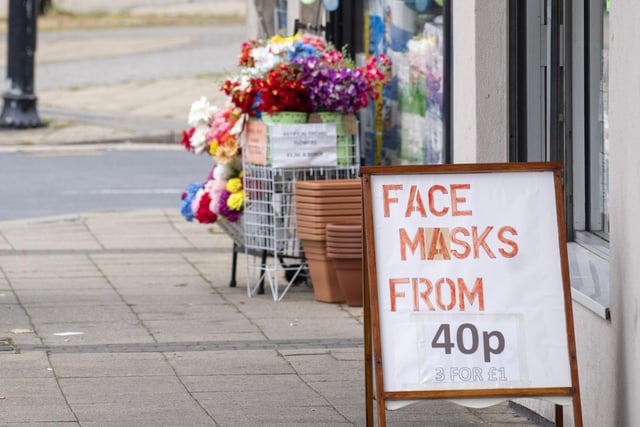 A sign advertises the sale of face masks as shops in Heckmondwike reopen to the public. Picture: Scott Merrylees