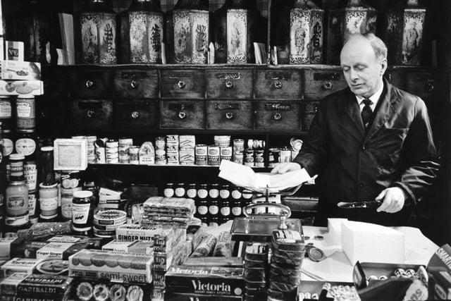 Mr. William Hirst Spiking at work in his shop in Bond Street, the oldest shop in Dewsbury.