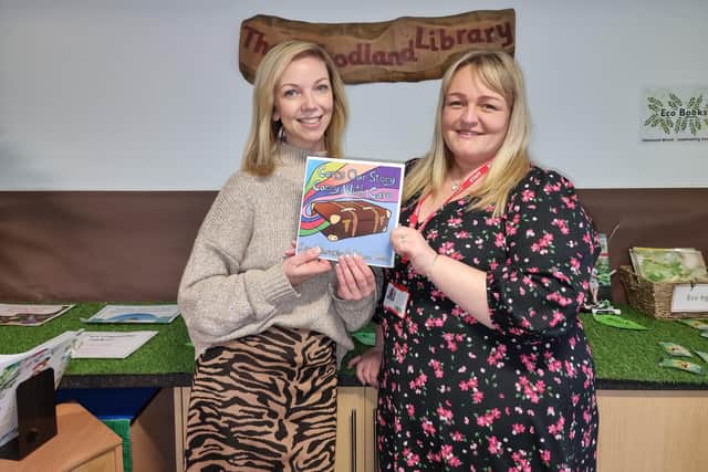 Diamond Wood Community Academy headteacher, Sally Titherington, left, and deputy headteacher Rebecca Price, with their book ‘Carry Our Story, Carry With Care.’