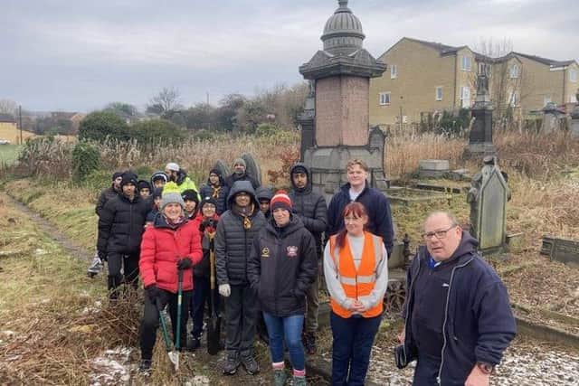 Batley and Spen MP Kim Leadbeater helped out with local volunteer group Keep Hecky Tidy, Heckmondwike councillors and the Heckmondwike Scout Group to spruce-up the overgrown graveyard at the Upper Independent Chapel.