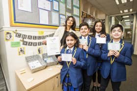 Carlton Junior and Infants School headteacher, Rizwana Mahmood-Ahmed, has received an MBE as part of the King’s first Official Birthday Honours List. Seen here with pupils from the school after receiving NACE Challenge Award for the second time earlier this year.