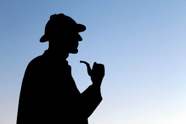 Silhouette of Sherlock Holmes's statue in London near Baker Street. Photo: Getty Images