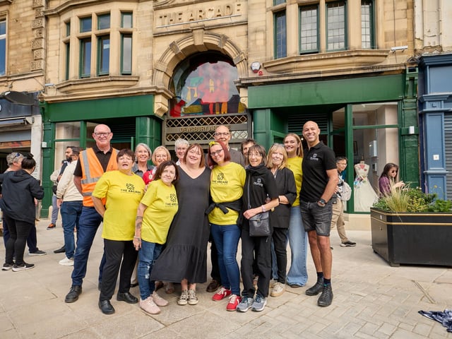Some of the hardworking volunteers behind the Arcade's re-opening.