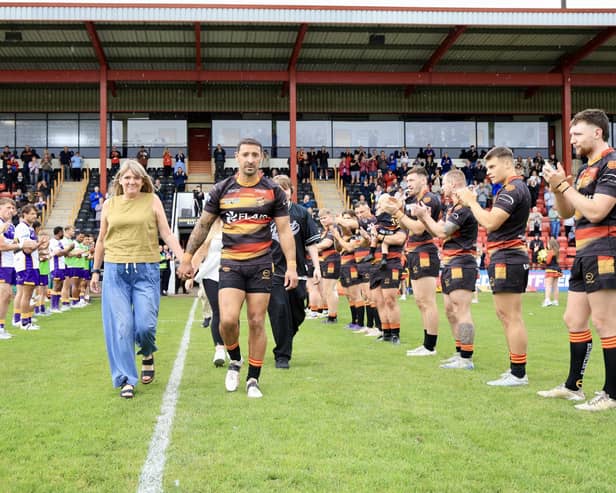 Paul Sykes walks out to a guard of honour before Dewsbury Rams' game with Newcastle Thunder. Picture: TCF Photography
