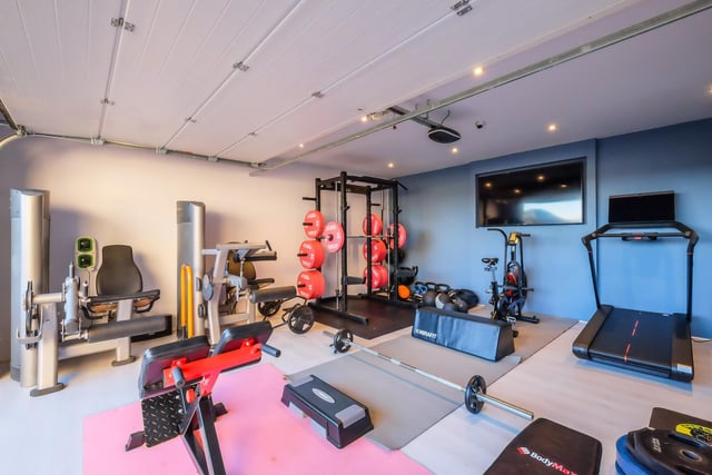 Versatile space that currently hosts a home gym.