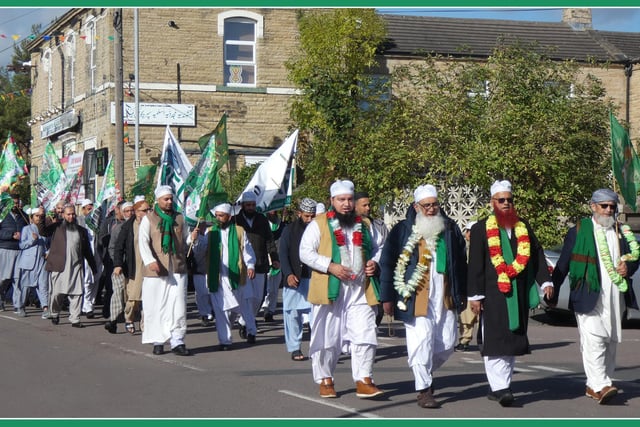 Worshippers from the Aslamiya Naqshbandi Jamia Mosque setting off on the Procession as they walk on Ravensthorpe's North Road.