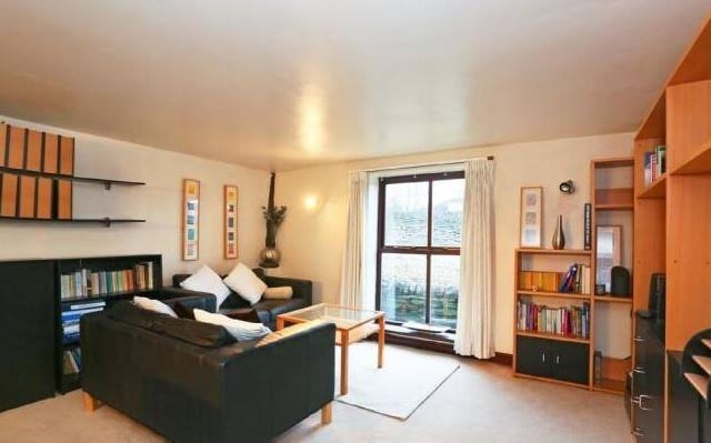 A seating area that could easily be used for home working or alternative use.
