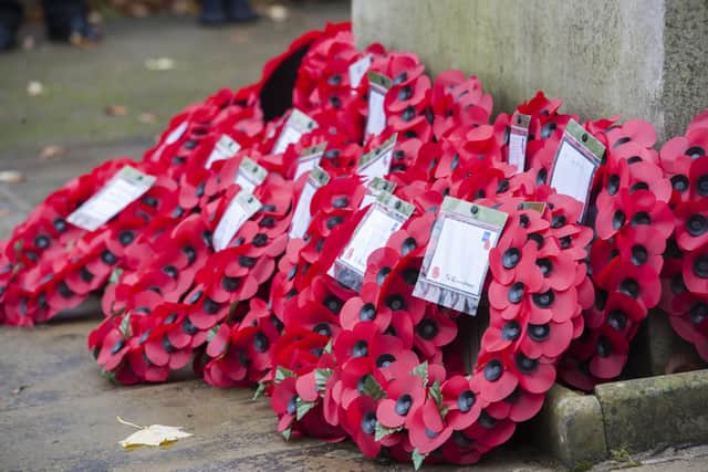 Wreaths lay below the cenotaph in Ings Grove Park following a previous Mirfield Remembrance Parade.