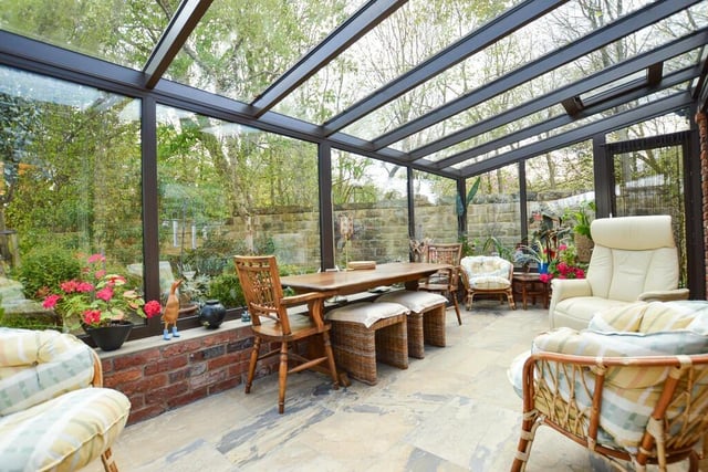The spacious and tranquil garden room has access to outdoors.