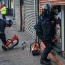 Officers carrying out a warrant at a premises in Ravensthorpe as part of the 'Clear, Hold, Build' programme.