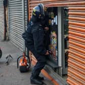 Officers carrying out a warrant at a premises in Ravensthorpe as part of the 'Clear, Hold, Build' programme.