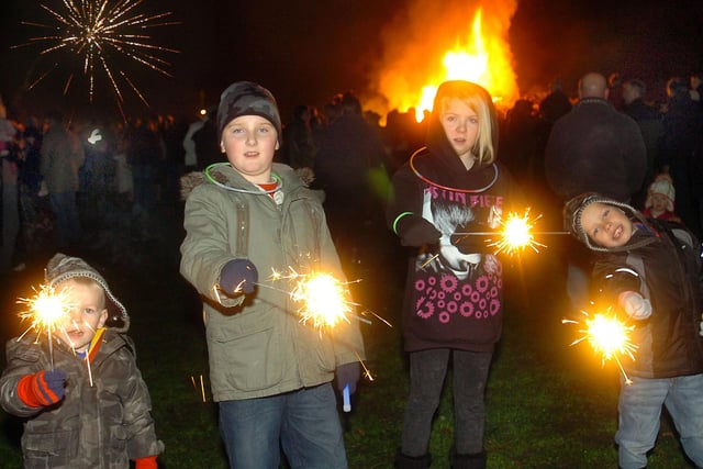 Enjoying the bonfire in 2010, Adam Munt, Liam Munt, Sophie Murphy and Ewan Murphy.