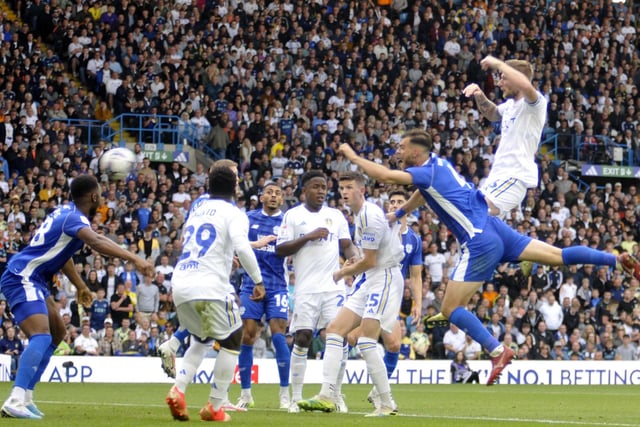 Liam Cooper climbs high to score Leeds United's first goal.