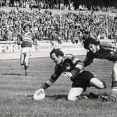 Mike Stephenson scores a try for Dewsbury in the 1973 Championship final against Leeds