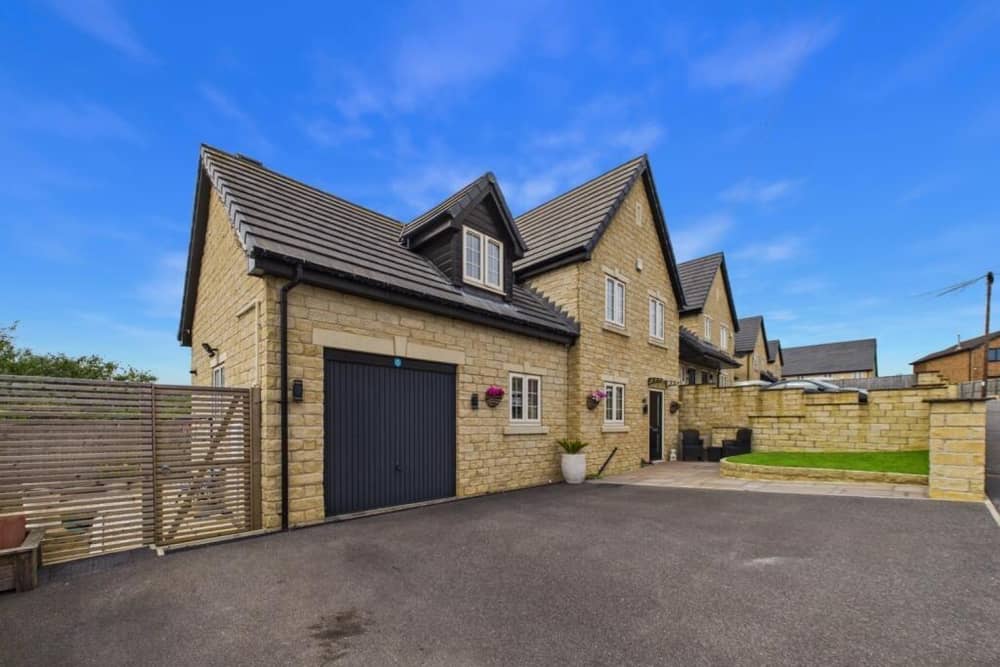 This property, on Moat Hill Farm Drive in Birstall, is on sale with EweMove for offers over £425,000.