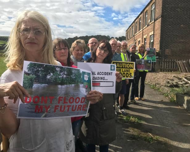 Members of Granny Lane Area Action Group (GLAAG) by meadowland in Hopton Bottom, near Mirfield, destined for housing